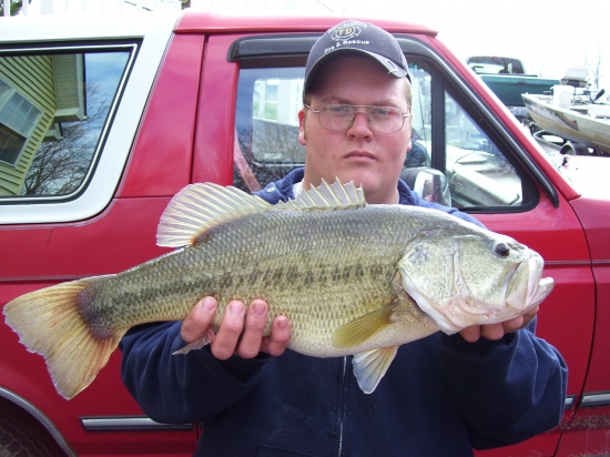 I caught this large mouth bass in a lake in Elizabethtown Kentucky with number 5 shad rap in February 2008 the water tep was unseasonably warm  that year ant the bass were shallow my dad, brother, and i caught fish all day long.  the monster was 6lbs 2oz the biggest bass i had ever caught.