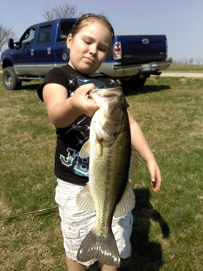this is her first bass of 2011 and there will be alot more because she loves it more than anything and i have to say it because she makes me Bill Dance is her and her dads favorite fisher!!