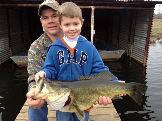 Cole (6) with his 9 lb bass caught on New Years Eve with a live minnow on a Zebco 33