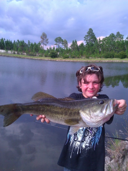 My little stepbrother just hooked into this giant. Look out!