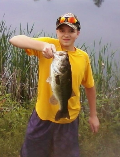 I caught this 6 lb bass on a white and red spinner in a farm pond