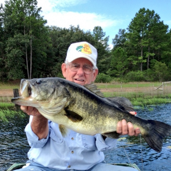 This is my grandfather Carl Hattabaugh. This is his monster 14lbs largemouth. Last cast of the day....