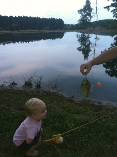 this is my daughter Avonlea not hardly even two and this is her first fish and boy did she love it. i love to fish but seeing her face makes it all so much better. so mom's and dad's get them out there. rain or shine, tight lines.
