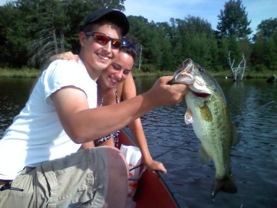 This is my biggest bass i have ever cought, I got it in the summer of 09 in Penfield Pa fishing out of my canoe with my best friend shawn and my girlfriend stephanie. I cought it on a Berkley 7in motor oil worm. Unfortunately I did not have a scale on me and did not want to end its life to find out how much it weighed.