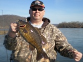 This is my first Susquehanna River Smallie, taken on 4/18/09 at Mongomery Ferry, Pennsylvania, on the Red Baby Tadpole.  She clobbered the lure, and took nearly 5 minutes to land.  She was 19 inches long, 3 pounds, 9 ounces, and was released safely after the photo.