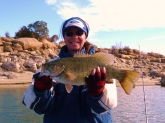 I caught this smallmouth in Navajo Lake in northern New Mexico. She weighed 6lbs. 7oz. and was 21 inches long. I caught it Nov. of 08. In about 15 feet of water, the water temp. was 60. I was fishing a drop-shot, 3in smoke sinko. It was the only fish I caught that day, but worth the being out in cold weather.