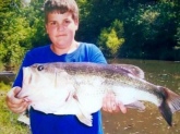 I was 10 years old when I caught this 7lb. largemouth Bass in 2006. I caught it in a local pond in gruetli Laager TN.