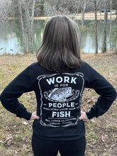 Load image into Gallery viewer, Lifestyle photo of back profile of a woman wearing the Bill Dance “Work” long sleeve t-shirt